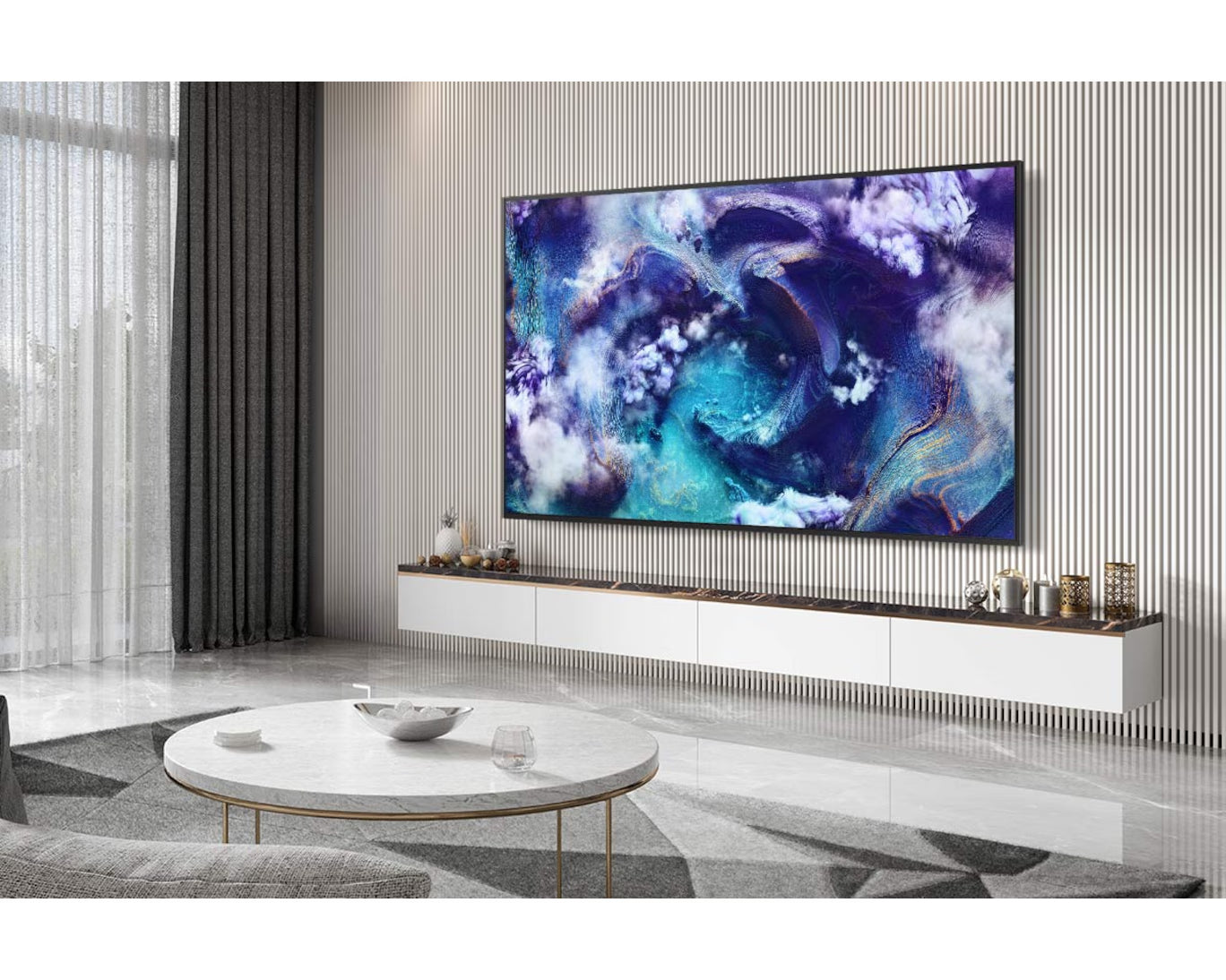 Modern living room with a large flat-screen TV displaying an abstract design.