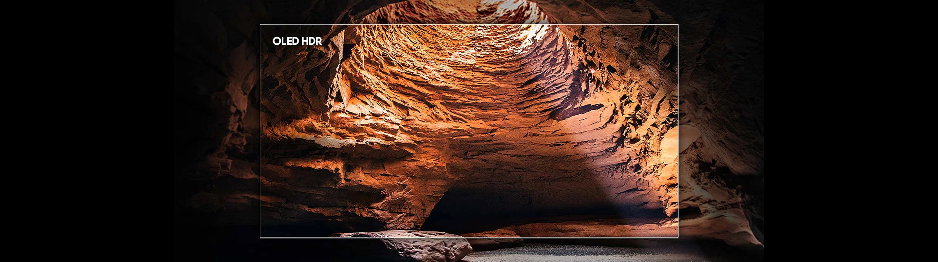 TV screen displaying a cave scene with 'OLED HDR' text.
